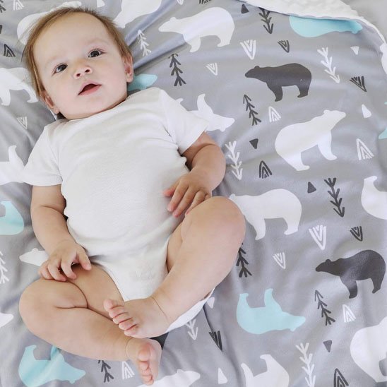 Couverture en polaire bébé variante ours des neiges sur enfant