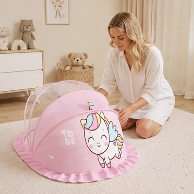 Moustiquaire lit bébé rose installe au sol 