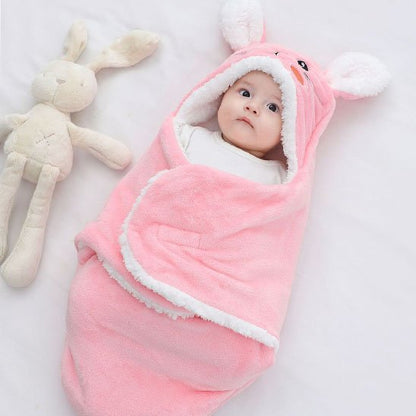 Nid d'ange rose bébé est à l'intérieur