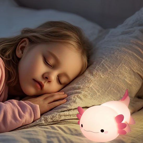 Veilleuse bébé dort avec à coté de l'oreiller